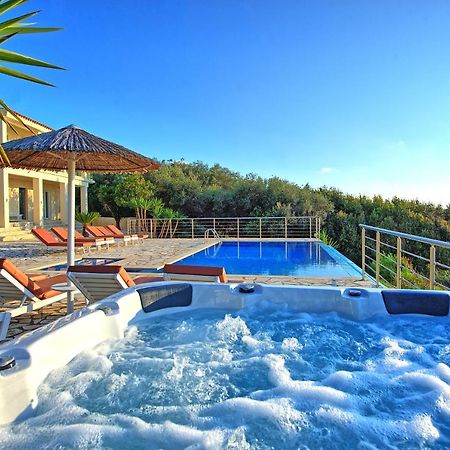Beachfront Villa Seasun By Posarellivillas Agios Spyridon  Экстерьер фото