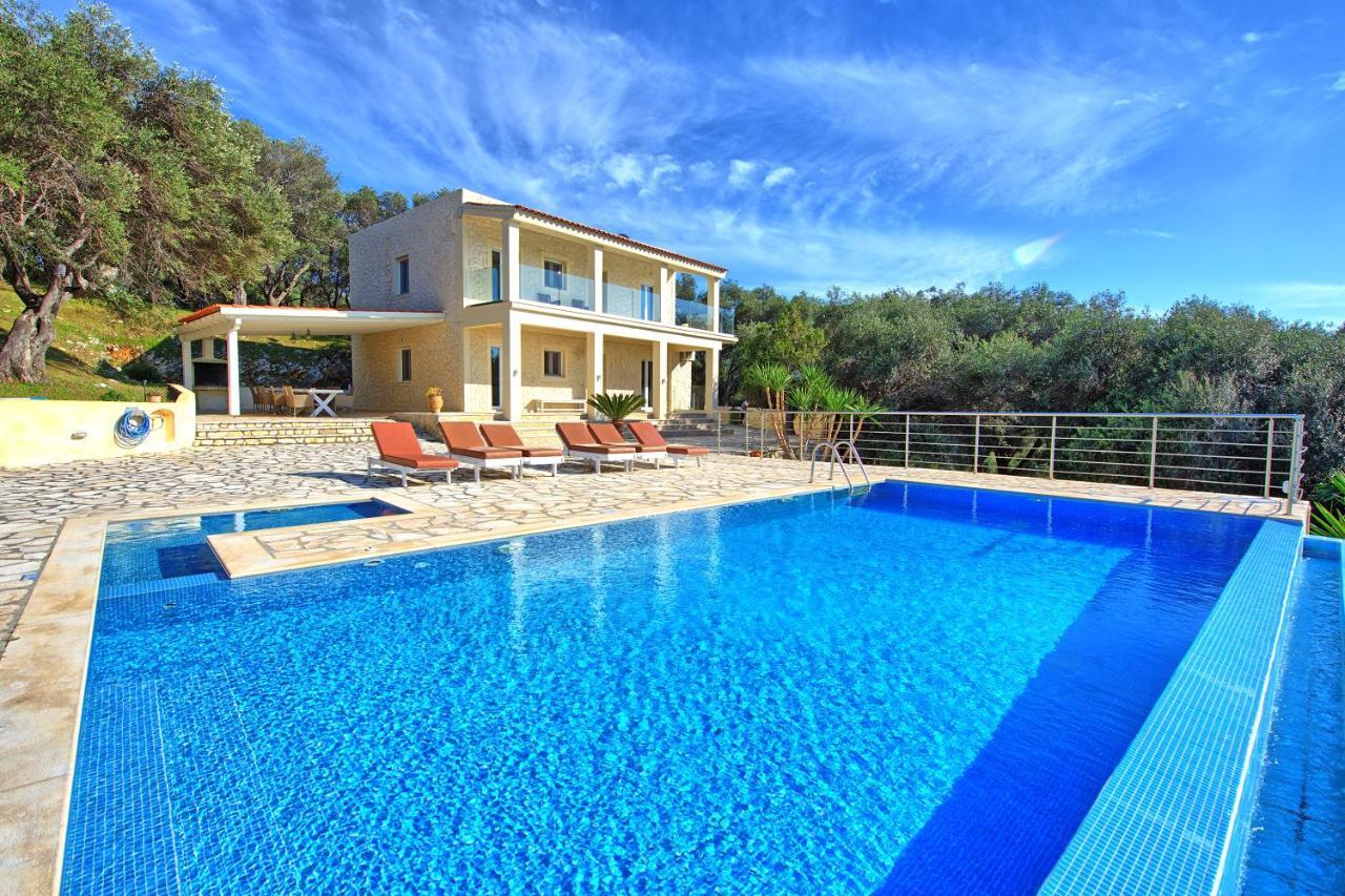 Beachfront Villa Seasun By Posarellivillas Agios Spyridon  Экстерьер фото